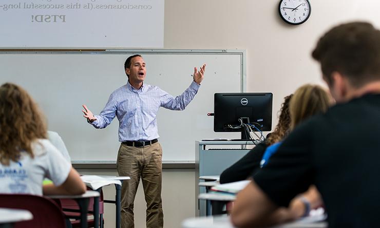 John Stachula in front of class